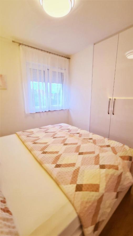 Apartment Karamarko Малинска Экстерьер фото
